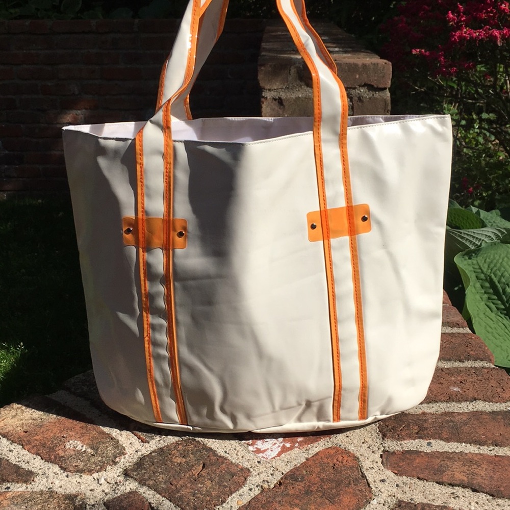 White bag with orange accents